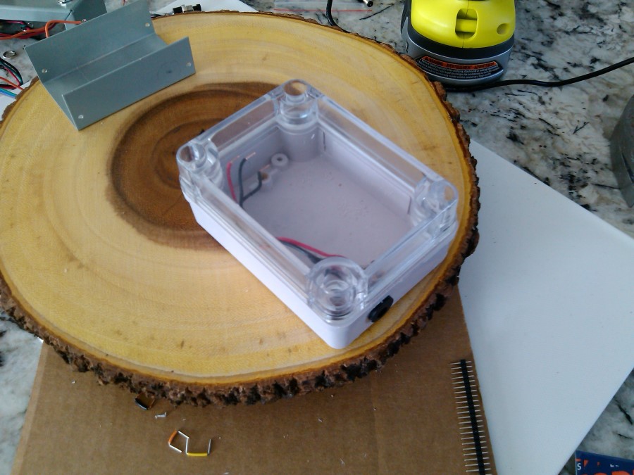 The control and electronics enclosures on the burl base